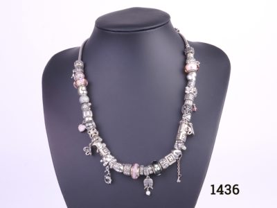 Pandora solid silver necklace fully loaded with 41 charms and a safety catch All hallmarked Ale 925 Necklace weighs 158.4g Main photo showing front view of necklace on display stand
