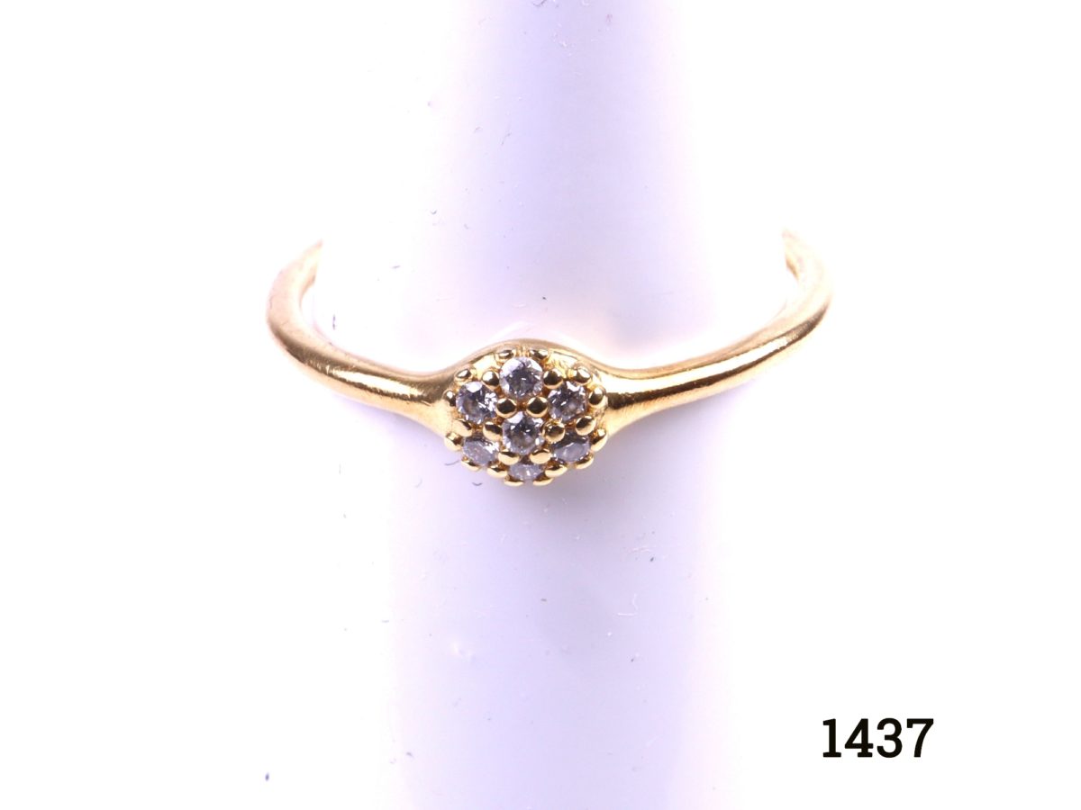 18 carat yellow gold Pandora love pod stacking ring with seven round cut diamonds. Size N / 6.5. Main photo of front view of ring on display stand.