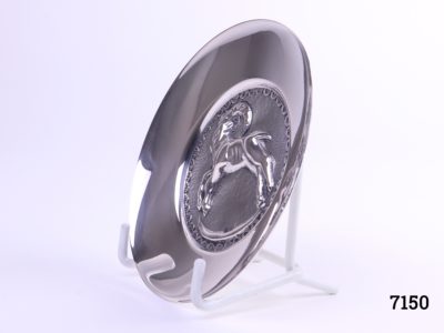 Danish silver pin dish with a figure of a ram to the centre Hallmarked Nrn 830 Measures 97mm in diameter Side view photo of dish on stand