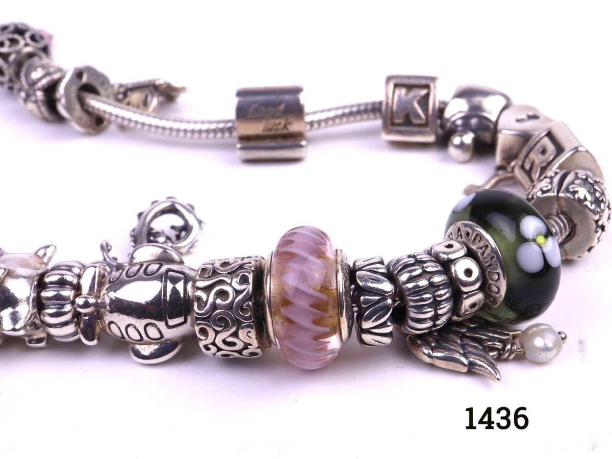 Pandora solid silver necklace fully loaded with 41 charms and a safety catch All hallmarked Ale 925 Close up photo of some of the charms