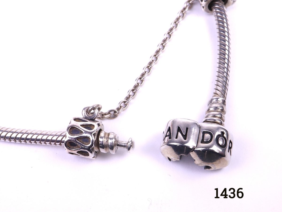 Pandora solid silver necklace fully loaded with 41 charms and a safety catch All hallmarked Ale 925 Close up photo of the clasp and safety chain