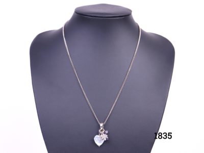 Azuni sterling silver necklace decorated with pearlised heart, leaves & crystal glass bead charms from Antiques of Kingston. Pendant drop length 30mm.