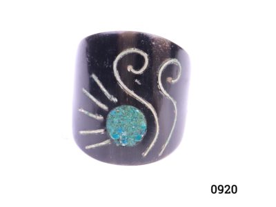 Inlaid tagua nut ring with silver and mosaic turquoise inlay. (Tagua nut also known as vegetable ivory). Measures 25mm by 24mm at front Main photo showing ring frontage