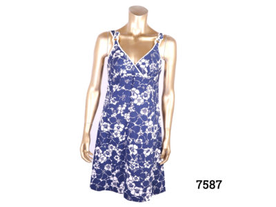Original 1960s St Michaels mini dress in blue and white floral pattern. Size 10. (Some staining on inside bust area). Main photo of front of dress.