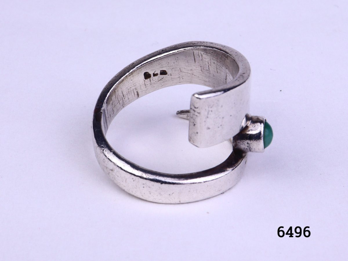Modernist style vintage silver ring. Vintage sterling silver ring in an asymmetrical twist design with single small turquoise stone accent Size M.5 / 6.5 Photo showing the 925 hallmark