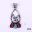 Vintage Navajo sterling silver eagle pendant with coral & turquoise stones. Signed and fully hallmarked on the back. Main photo showing whole front of pendant with eagle to the centre and three stones below 2 coral with turquoise stone in middle