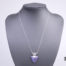 1980s vintage magenta turquoise pendant set on solid silver mount with sterling silver fine Italian chain. Both chain and pendant stamped 925 for sterling silver. Pendant drop length 30mm. Main photo of necklace displayed on a stand