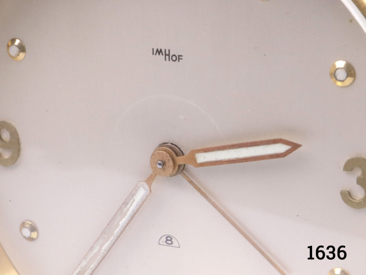 Vintage 1970s Swiss made 8 day desk clock alarm by ImHof. Clock face measures 75mm in diameter. (Some signs of wear) Fully serviced and guaranteed for 1 year from date of purchase Close up photo of the hands on clock face and makers mark