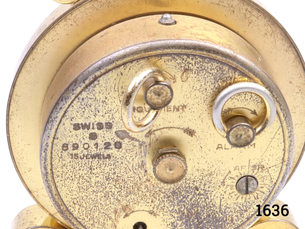 Vintage 1970s Swiss made 8 day desk clock alarm by ImHof. Clock face measures 75mm in diameter. (Some signs of wear) Fully serviced and guaranteed for 1 year from date of purchase Close up photo of the back of clock
