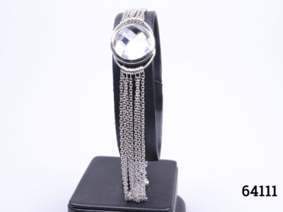Vintage Vallès Dordal Paris sterling silver bracelet. Designer bracelet with 7 silver chain strands either side of faceted crystal ball in the centre. Slightly adjustable from 175mm to 210mm Bracelet weighs 15.2grams Main photo of bracelet on display stand showing faceted crystal at top