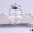 c1907 Birmingham assayed sterling silver and cut glass inkwell and stand. Inkwell sits securely in the hole in the centre of the stand. Inkwell weighs 190.6grams and measures 52mm x 45mm and 70mm tall. Stand measures 150mm long (including handles) and 110mm wide and weighs 95grams Main photo showing inkwell set on tray with tray handles to left and right