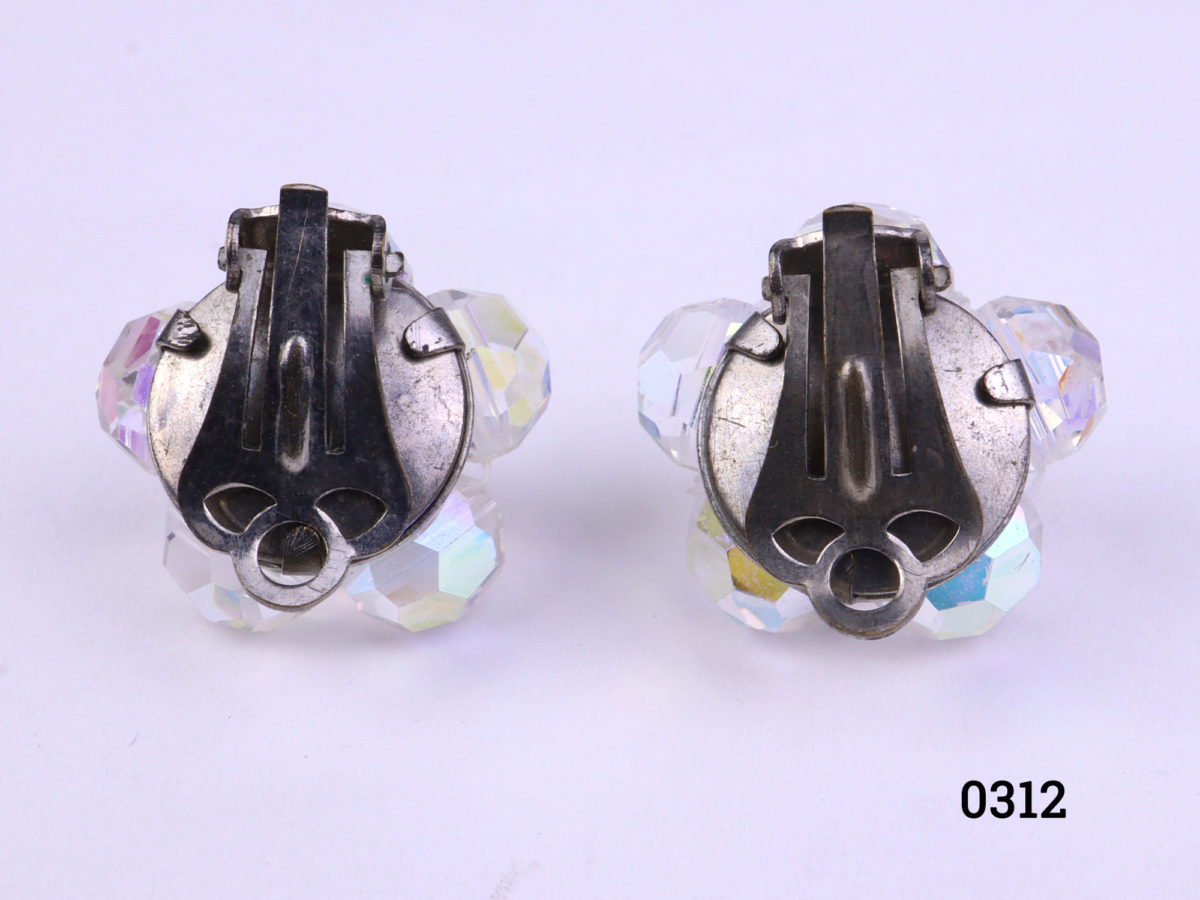 Vintage clip-on earrings with crystal glass beads Clips in good working order No makers mark Measures 20mm in diameter Photo of back of earrings showing clips