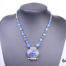 Vintage Tibetan silver necklace with turquoise and lapis lazuli beads and a lapis lazuli box pendant. Pendant has a secret compartment that opens at the back and measures 38mm long by 30mm wide Main photo of necklace displayed on a stand seen from the front