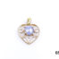 Vintage 18 karat gold heart pendant set with a star sapphire cabochon to the centre. Hallmarked GH18k on the pendant bail. Drop length 25mm Main photo of pendant on a flat surface shown right way up with bail to the top