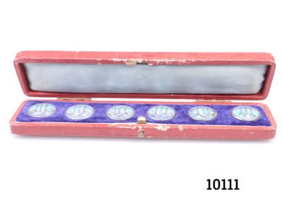 Antique boxed set of Art Nouveau buttons. 6 silver buttons with enamel decoration to each front. Original case.(some wear) Each button weighs 2.7g and measures 20mm in diameter Main photo showing all six buttons inside the open original case