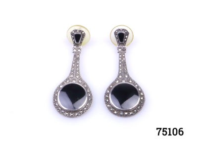 1980s Art Deco style earrings with jet & marcasite on silver. Hallmarked 925 for sterling silver.  Comes with plastic fastening at back for security. Silver butterflies can also be provided if preferred. Will be mailed boxed. Earrings weigh 11 grams. Drop length 50mm. With at widest part of earring at bottom 20mm. Main photo of both earrings laid on a flat surface