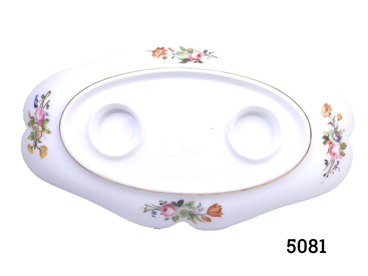 Antique 19th century Paris porcelain double condiment pots on a tray. Identical sized lidded condiment containers attached to a decorative tray. Floral design with peppermint green and gilt. In excellent condition throughout with minor marks inside the pots only. Pots measure 82mm in diameter across the top. Photo of base of plate/tray