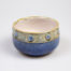 c1923 to 1927 small Royal Doulton bowl. Pretty bowl in iconic Doulton colours. Marked 8200 and accredited to artist Louisa Ayling. Measures approximately 85mm in diameter at base and 110mm across the top. Main photo of bowl seen from a slightly raised eye level angle