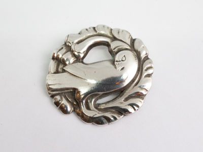 Vintage Georg Jensen dove brooch. Iconic early Georg Jensen dove brooch with No.165 stamped to the back. Made for import to London Bond St shop 1936-44. Main photo of brooch front.
