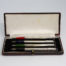 Cased set of 4 silver bridge pencils. Lovely vintage set of 4 pencils with different coloured ends in black, green, blue & red. Each pencil marked sterling silver and measures 95mm long and weighs 6.5gms. Main photo of all 4 pencils laid in the open case