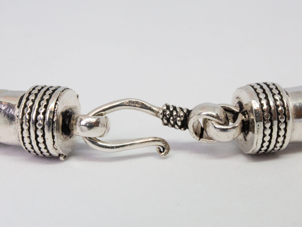 Modern sterling silver necklace. Unusual silver necklace with a bubbles or water droplets like chain. Nice length so closer to neck like a choker. Hallmarked 925 to the link. Further close up of the clasp area.