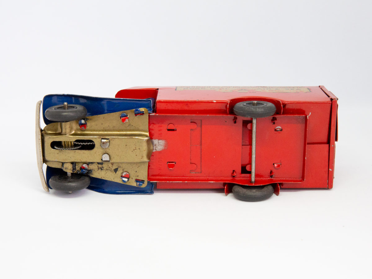 Vintage Minic clockwork delivery van. Wonderful Minic clockwork toy van including original key and box. Van measures approximately 150mm long by 46mm wide and 62mm tall. Photo of the base of van.