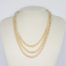 Art Deco graduated pearl necklace. Stunning necklace with 3 strands of graduated pearls and a paste stone encrusted clasp. Unidentifiable hallmark to back of clasp. Made in France. Shell shaped box included but not original. Shortest strand measures approximately 420mm and longest 450mm. Necklace weight 47gms. Main photo of necklace displayed on a stand.