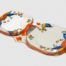 Art Deco sandwich set by Charlotte Rhead. A pretty and practical set comprising of a serving plate/tray with 2 shallow dish shaped plates connected with a handle to the centre and 6 small square side plates. Hand-painted in cheerful bright vibrant colours to cheer up any occasion. Design number 4133 'New Jazz' pattern c1928-1929. Each piece marked with the green Burleigh ware stamp with Rhead signature on the base of the serving plate. Visible crazing to each piece and some wear around the edge, especially around serving plate. Each small plate measure 145mm square and the serving plate/tray measures 330mm long,150mm wide and approximately 50mm tall by handle. Main photo showing the whole set as it comes with 3 side plates each on each side of the serving platter.