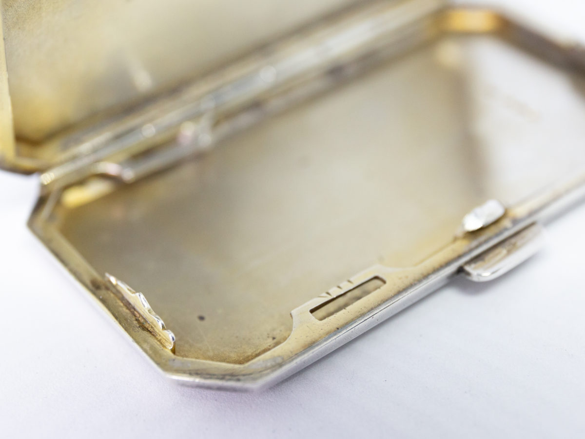 Ladies guilloche enamel and silver cheroot case. Stunning ladies Art Deco cheroot case with yellow guilloche enamel to one side. 925 hallmark for sterling silver in several areas. Gilded interior. In wonderful condition throughout and closes tight. Missing the elasticated band inside. Import mark for Glasgow c1925. Made by Scholl Ltd. Close up photo of the slots where the missing elasticated band which hold the cheroots in place should be.