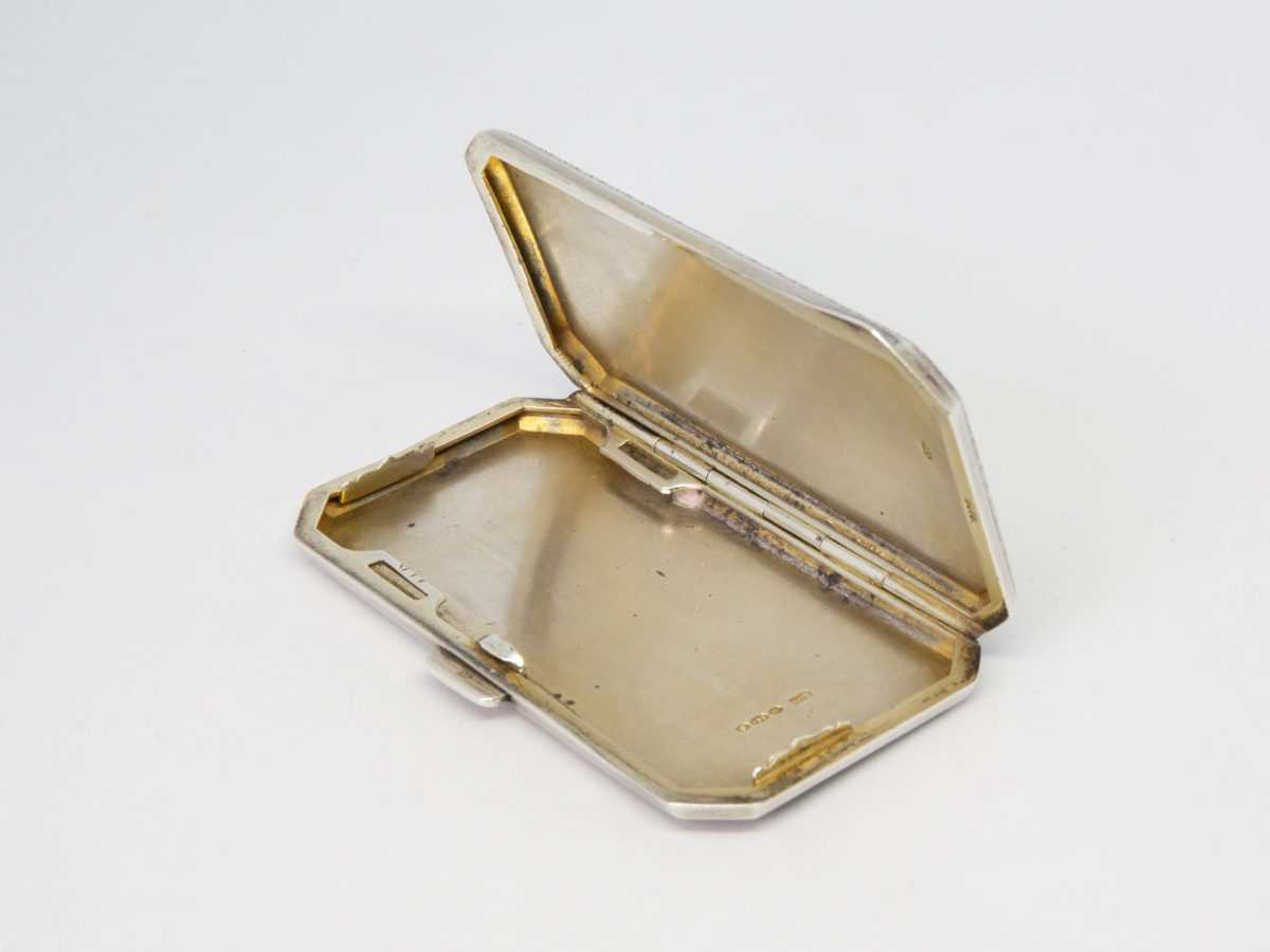 Ladies guilloche enamel and silver cheroot case. Stunning ladies Art Deco cheroot case with yellow guilloche enamel to one side. 925 hallmark for sterling silver in several areas. Gilded interior. In wonderful condition throughout and closes tight. Missing the elasticated band inside. Import mark for Glasgow c1925. Made by Scholl Ltd. Photo of open case with the enamel side open and at the top. Hallmark is visible on both open sides.