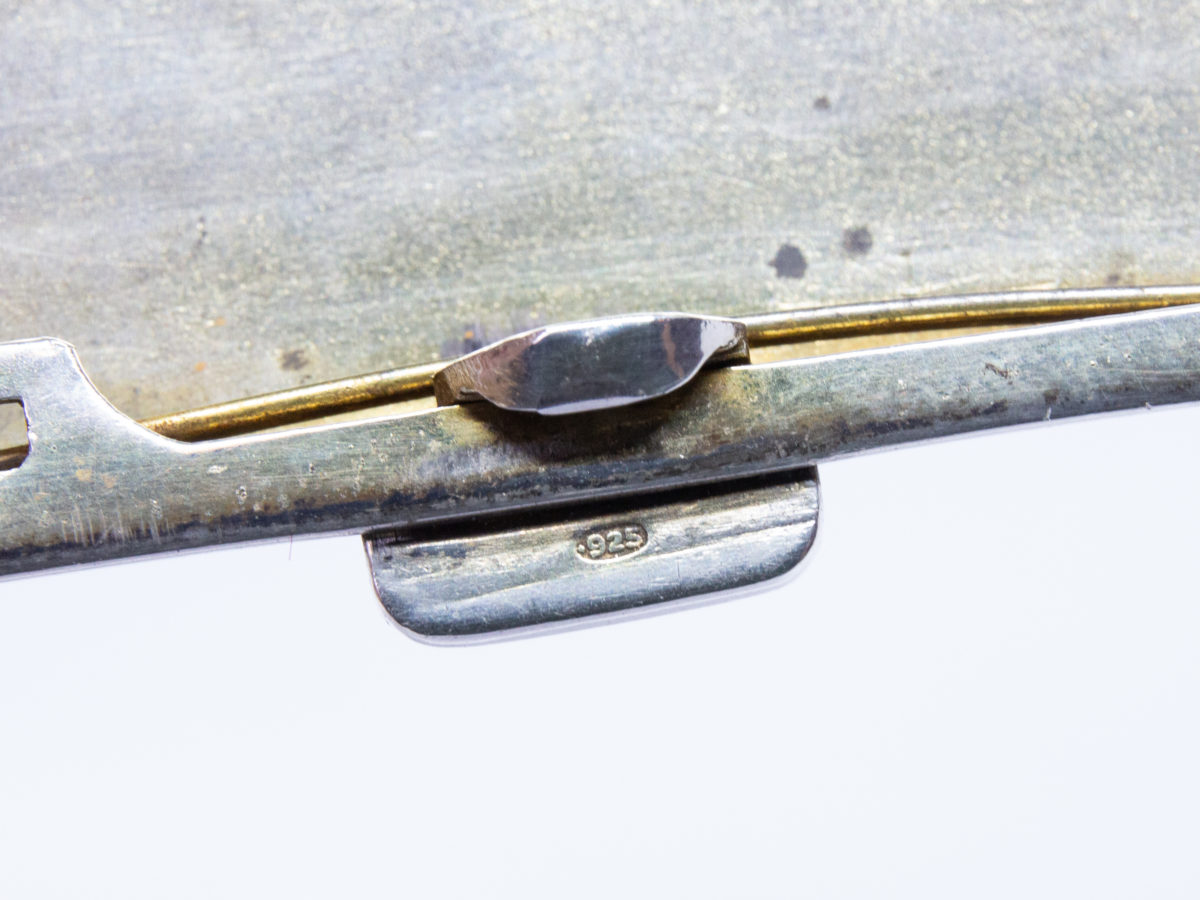 Ladies guilloche enamel and silver cheroot case. Stunning ladies Art Deco cheroot case with yellow guilloche enamel to one side. 925 hallmark for sterling silver in several areas. Gilded interior. In wonderful condition throughout and closes tight. Missing the elasticated band inside. Import mark for Glasgow c1925. Made by Scholl Ltd. Photo of the 925 hallmark on the opening clasp.