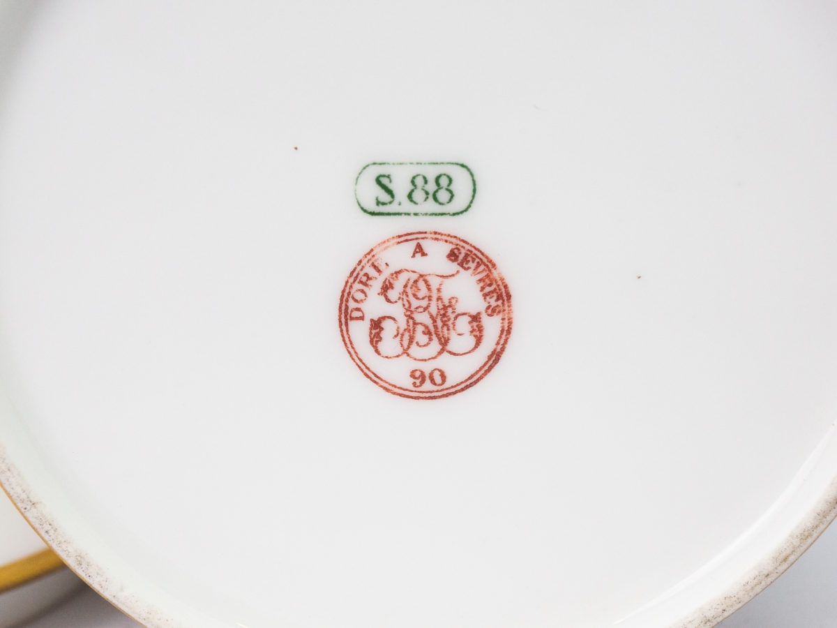 c1890 Dore a Sèvres lidded pot. Fine quality antique lidded pot in white porcelain with gilt accent. In excellent condition for its age. Stamped to base. Measures 85mm in diameter, top opening measures 95mm in diameter and lid overhangs at 102mm in diameter. Photo of makers stamps to the base of pot,