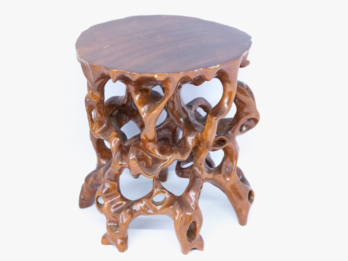 Vintage Chinese carved root stand. A carved hardwood root form stand finished in a hard wearing glossy varnish. Some minor scuff marks to the flat top. Measures 145mm long and 135mm wide at base. Flat top area measures 140mm at longest and 125mm at widest. Main photo of stand taken from a slightly raised angle showing the flat top surface and tangled roots area below.