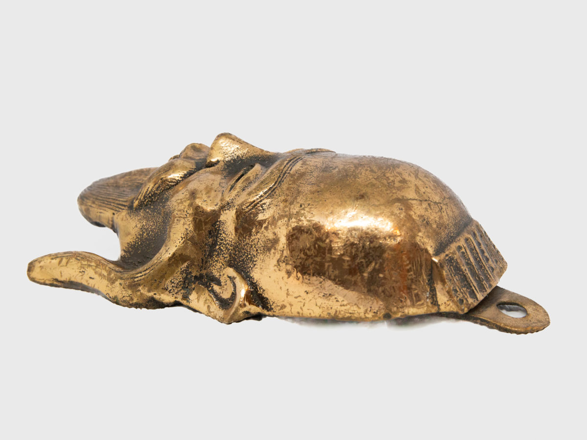 19th century Chinese bronze head. A very heavy and well made bronze head of a Chinese man (possibly deity Shou or Juroujin) in a brass finish. No markings. Attachment for hanging attached. Drop length 185mm. Photo of head in profile to the left side with top of head to the right.