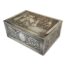 An engraved silver plate on copper French jewellery box . It dates from about 1900-1940.The lid is engraved with ‘The morning of the bridal party ( Le matin de la noce)’. There is considerable wear to the plate on the lid that allows the underlying copper to shine through also minor wear to the base. The box has its a original padded satin interior with a little wear to the silk. The box weighs 298grams. Main photo of box set at an angle showing length, width and top of box