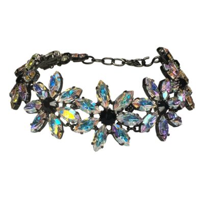 Vintage 1980s Butler & Wilson boxed aurora borealis flower choker necklace. The accompanying box measures 114 x 37x 114. The box has signs of wear but the choker is in excellent condition. Main photo of necklace set on a flat surface and shown set in a circular way as if worn on neck with clasp fastened