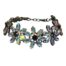 Vintage 1980s Butler & Wilson boxed aurora borealis flower choker necklace. The accompanying box measures 114 x 37x 114. The box has signs of wear but the choker is in excellent condition. Main photo of necklace set on a flat surface and shown set in a circular way as if worn on neck with clasp fastened