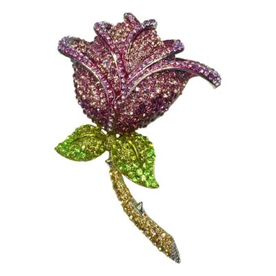 Large statement retired Butler & Wilson rose rhinestone rose brooch. Comes in its original box. Measures approximately 120 mms x 85 mms. Main photo of brooch seen from the front with rose flower at the top of photo.