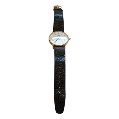 Gents Quartz Watch, Black Leather Rotary Strap, Original Boxes, Pre - Owned, Excellent Working Order, Gold Case Hallmarked Inside + Outside : 750 + 18kt. Photo of watch laid flat.