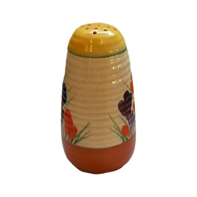 In the Autumn Crocus Pattern, Late 1930's, No Chips - Cracks -Hair Line Cracks or Restoration, Slight Crazing to Glaze, Correct Backstamp as in Photo. Measures 68mm in diameter at base and 39mm in diameter at top. Photo of sugar sifter from side with least floral decoration.
