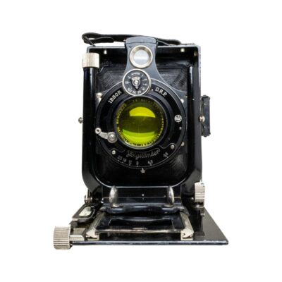 A Voigtlander Vag folding camera for 120 film and quarter plate film. Made circa 1930. Voigtlander Voigtar Anastigmat f4.5 lens. Main photo of camera seen straight on front the front - say cheese !