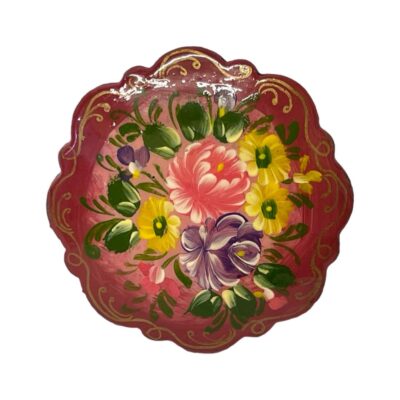 Vintage hand-painted lacquered brooch. Pretty circular Russian lacquered brooch hand-painted with flowers and foliage. Initialled to the back. Some wear of the black to the back of brooch. Main photo of brooch front. The base colour is a deep pink with flowers in yellow, purple, lighter pink and with green leaves.