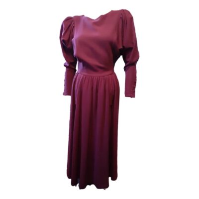 Collectable late 70s - 80s Droopy Browns Burgundy wine moss crepe (wool) dress of quality. Leg of mutton sleeves with long buttoned cuffs. Good for today's sizing 8 to 10. So much fabric in skirt and has POCKETS! we all love pockets....no faults perfect condition. Main photo of full length of dress seen from the front.