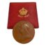 Queen Victoria commemorative medal for her diamond jubilee. A collectable bronze medal in original fitted case with a young Victoria c1837 to one side and reverse has image of the then queen in 1897. Medal measures 55mm in diameter. The clasp of the case is not working and does not close shut. Main photo of medal displayed leaning against the closed fitted case and showing the later Queen Victoria side of medal.