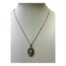 Vintage 9 karat gold pendant with a single pearl & 2 small diamonds. Unusual pendant in yellow and white 9 karat gold with a pearl to the centre and 2 small round cut diamonds in the white gold accent to the side of the pearl. Hallmarked 375 and DIA to pendant bail and 375 to chain clasp. Pendant drop length 25mm and width 15mm. Main photo of necklace on a display stand and shown straight on from the front.