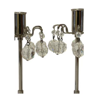 Pair of vintage J & L Lobmeyr crystal drop candlesticks. Elegant silver plated candlesticks with faceted Austrian crystal drops. Measures 70mm in diameter at base. Close up of the top of both candlesticks with some of the crystal drops shown.