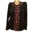 1950s Black lambs wool cardigan with red cherries detail around the neck, along the hook and eye fastening at the front and around the cuffs. Fully lined with no faults in perfect condition, good size 12/14….Rockabilly Swing. Main photo of cardigan seen with front facing forward. The hooks and eyes are done up to show the row of cherries all round the neck and down the front.