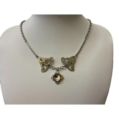 Art Nouveau style necklace by Lalique. Pretty sterling silver necklace embellished with pale golden yellow enamel and an attached small domed glass pendant. Necklace has room for slight length adjustment either side of the 410mm it is set at. Pendant drop length approximately 22mm. Main photo of necklace on a display stand and shown forward facing.