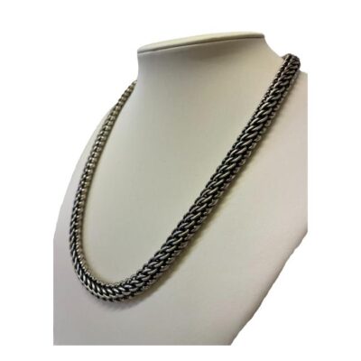 Heavy Mexican chain in sterling silver. Vintage chunky 925 sterling silver chain with a very intricate link pattern. Hallmarked 925 Mex to the clasp. Chain weighs 104gms. Photo of necklace displayed on a stand and seen from a side angle.