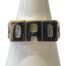 Sterling silver DAD ring. Modern ring in sterling silver with DAD spelt out to the front. Interesting chain like work to the shoulders. Hallmarked 925 for sterling silver. Ring size W.5 / 11.25 Ring weight 7.2gms. Main photo of ring displayed on a cone shaped stand and seen forward facing.